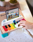 and Hape Magic Touch Piano Wooden Musical Toddler Toy, Age 6 Months and Up